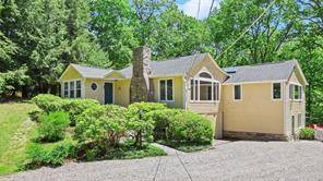 Light, bright, Furnished Stonybrook charmer tucked away at the end of a cul de sac and surrounded by nature.