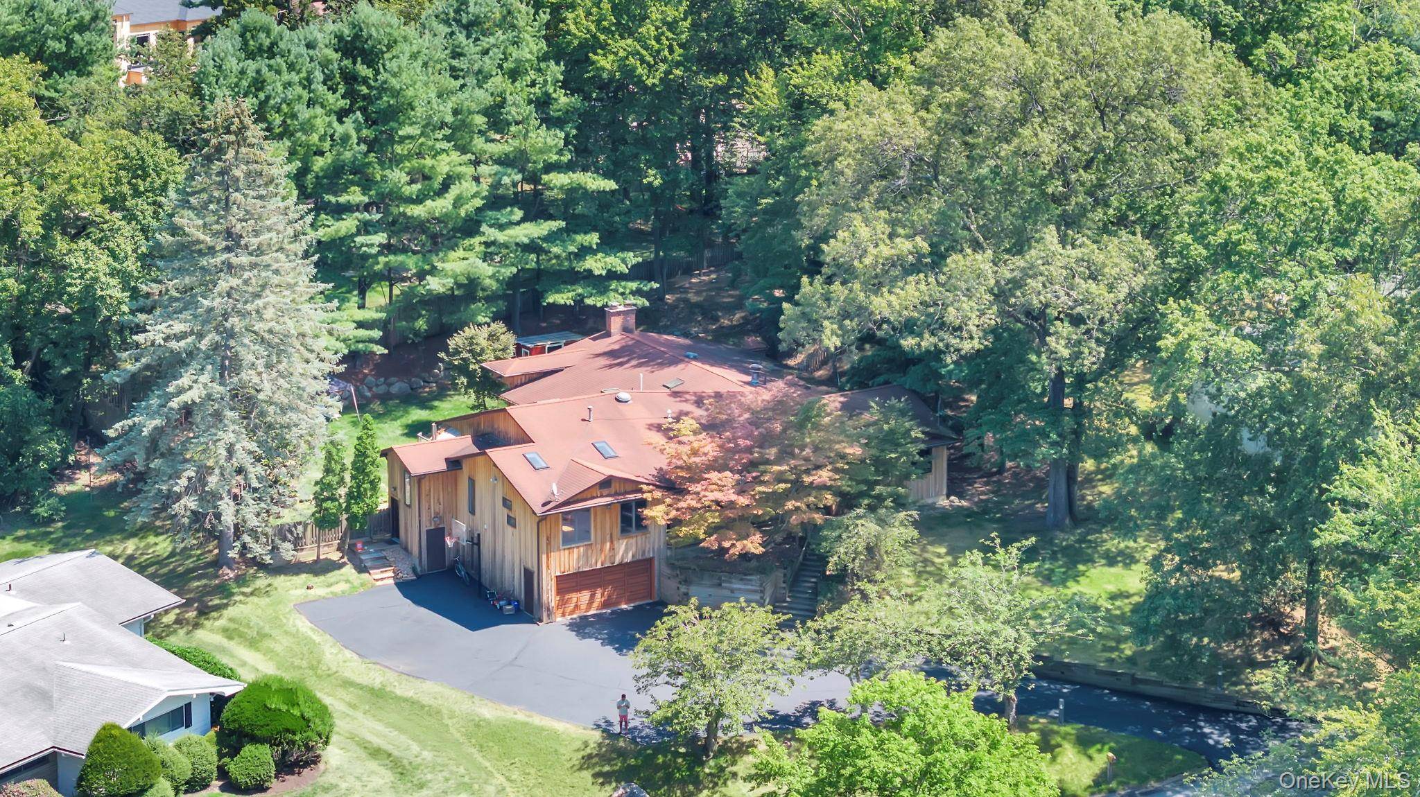 Monsey ! Tucked away on a quiet cul de sac, this stunning 4292 sq ft mid century modern ranch blends modern design with timeless warmth.