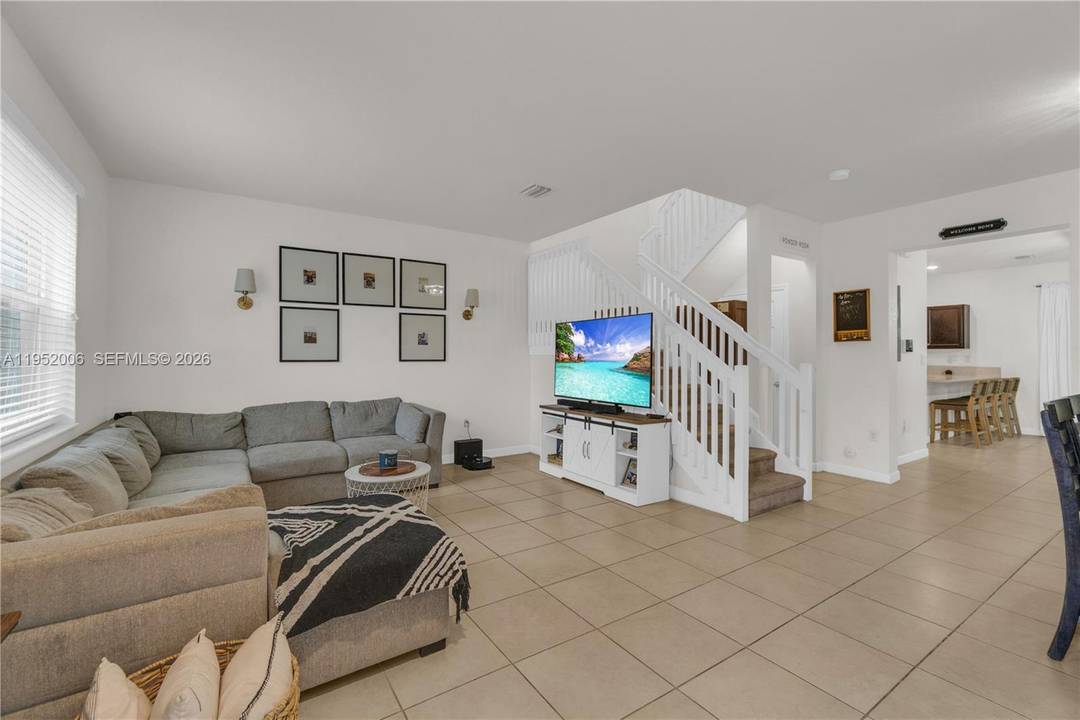 Welcome to this beautifully maintained two story townhouse in the desirable gated community of Artesa in Homestead !