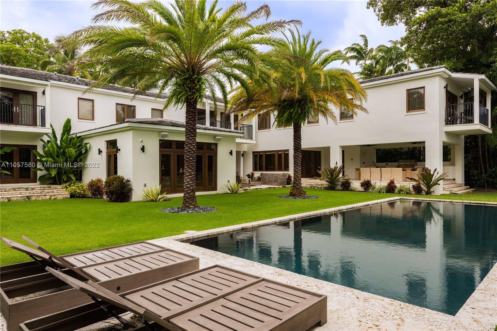 FULLY RENOVATED, 2 STORY WATERFRONT HOME ON A PRIVATE AND GATED COMPOUND LOCATED ON SUNSET ISLAND.