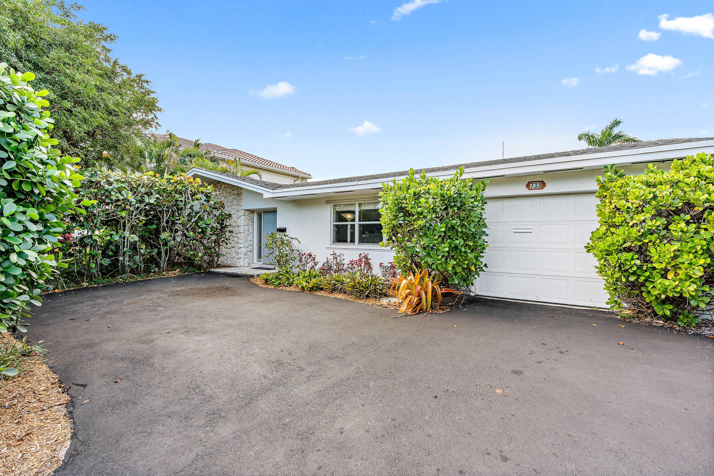 THIS IS IT ! Your ultimate waterfront haven in the heart of North Palm Beach awaits.