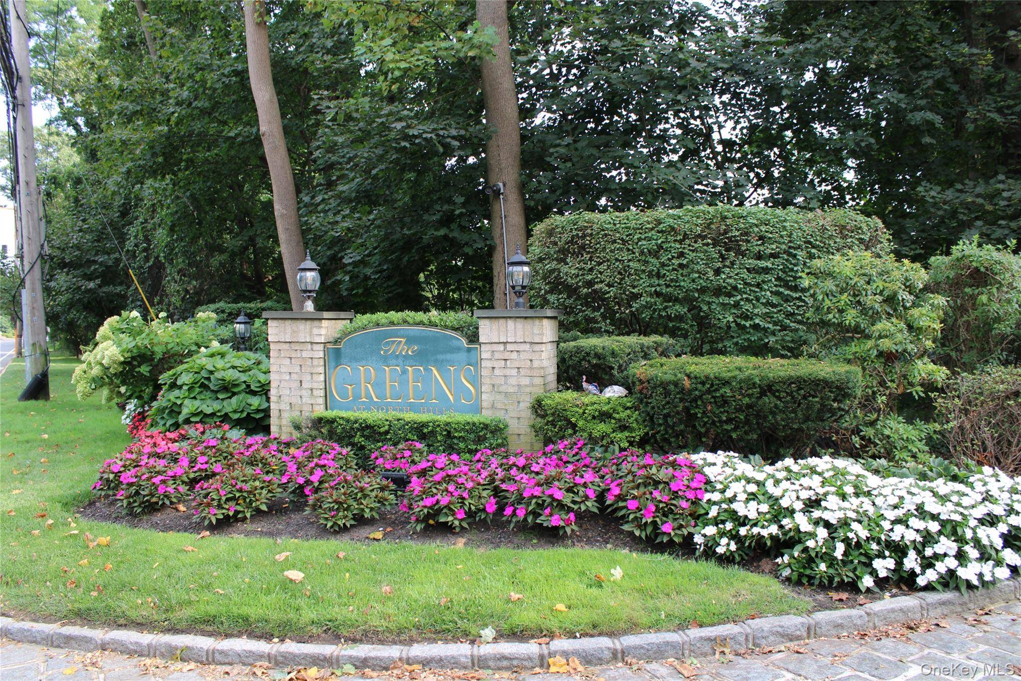 Beautiful condominium townhouse unit in The Greens condo development in the North Hills section of Manhasset, off of Shelter Rock Road.