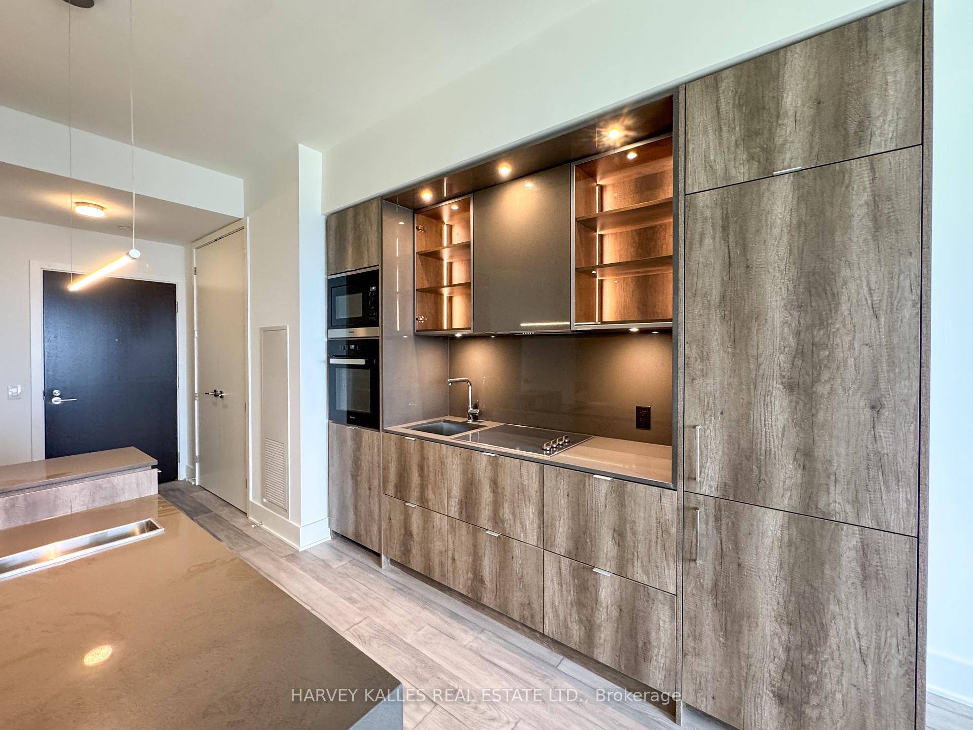 Experience elevated living in the heart of Yorkville with this stunning 1 bedroom den suite perched high on the 50th floor.