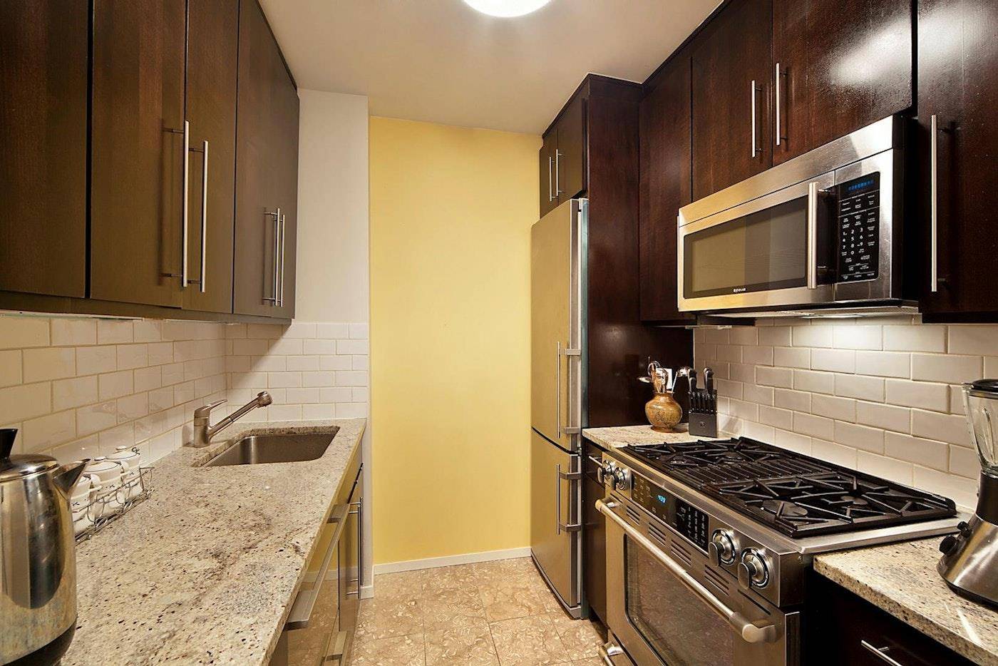 Spacious 1 BEDROOM HOME OFFICE with PRIVATE BALCONY facing East with beautiful river amp ; bridge views.