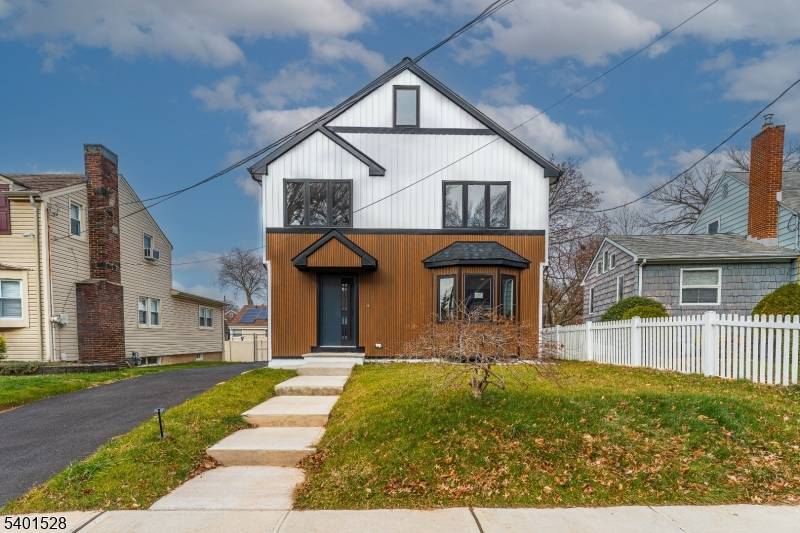 Welcome to this beautifully renovated colonial style home, perfectly situated on the sunny side of Linden.