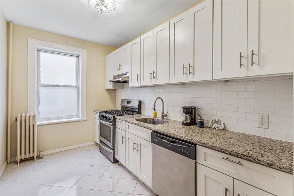 Immaculate and Updated Two Family Home on Prestigious Doctors Row Welcome to this exceptional and rare offering a meticulously maintained, semi attached townhouse spanning an impressive 20 feet wide by ...