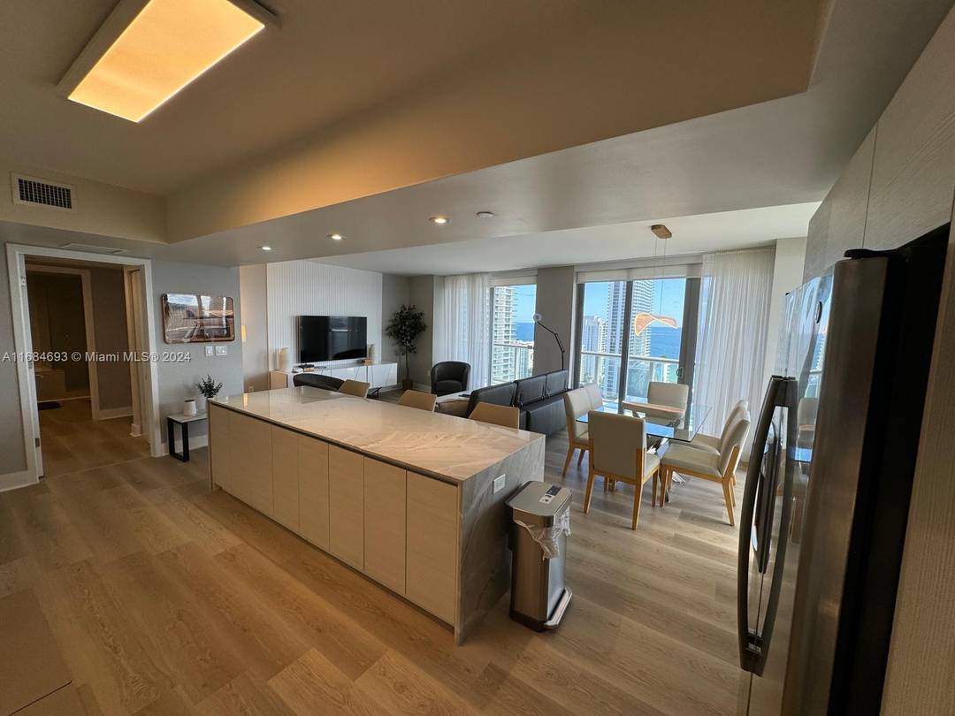 With NEW FLOORS, NEW KITCHEN and superb views of the City, Intracoastal, Ocean, and Direct ocean.