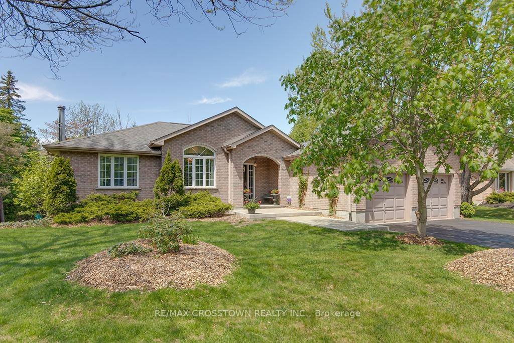 Beautiful all brick 3 1 bedroom 3 bathroom home with a finished walkout basement on a gorgeous mature treed lot in Snow Valley with over 3000 square feet finished.