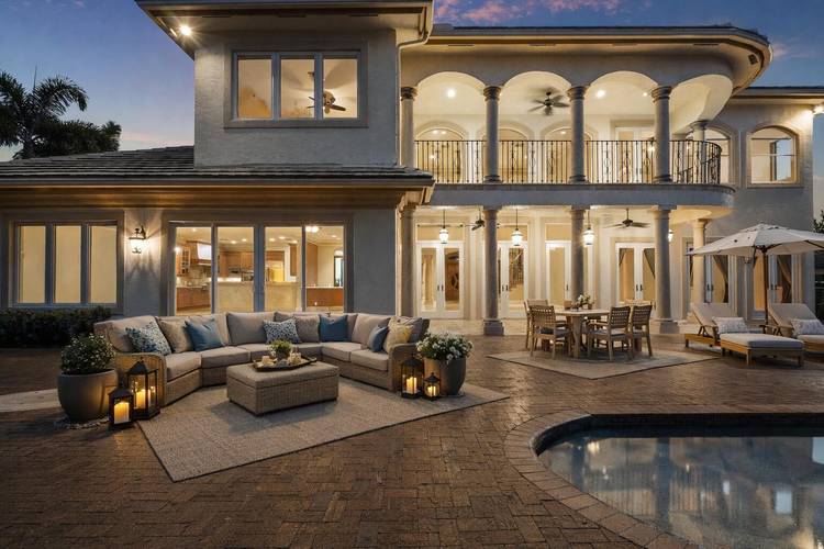 Your next home is a Magnificent Estate nestled in the prestigious gated community of Pine Tree Golf Club.