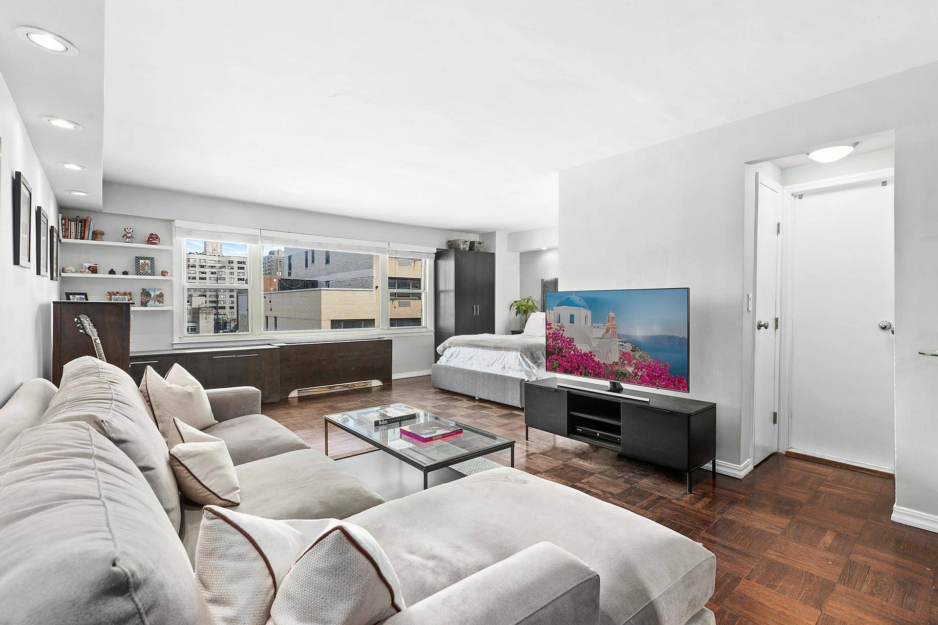 Welcome home to this extra large, high floor, sunny and bright renovated Jr.