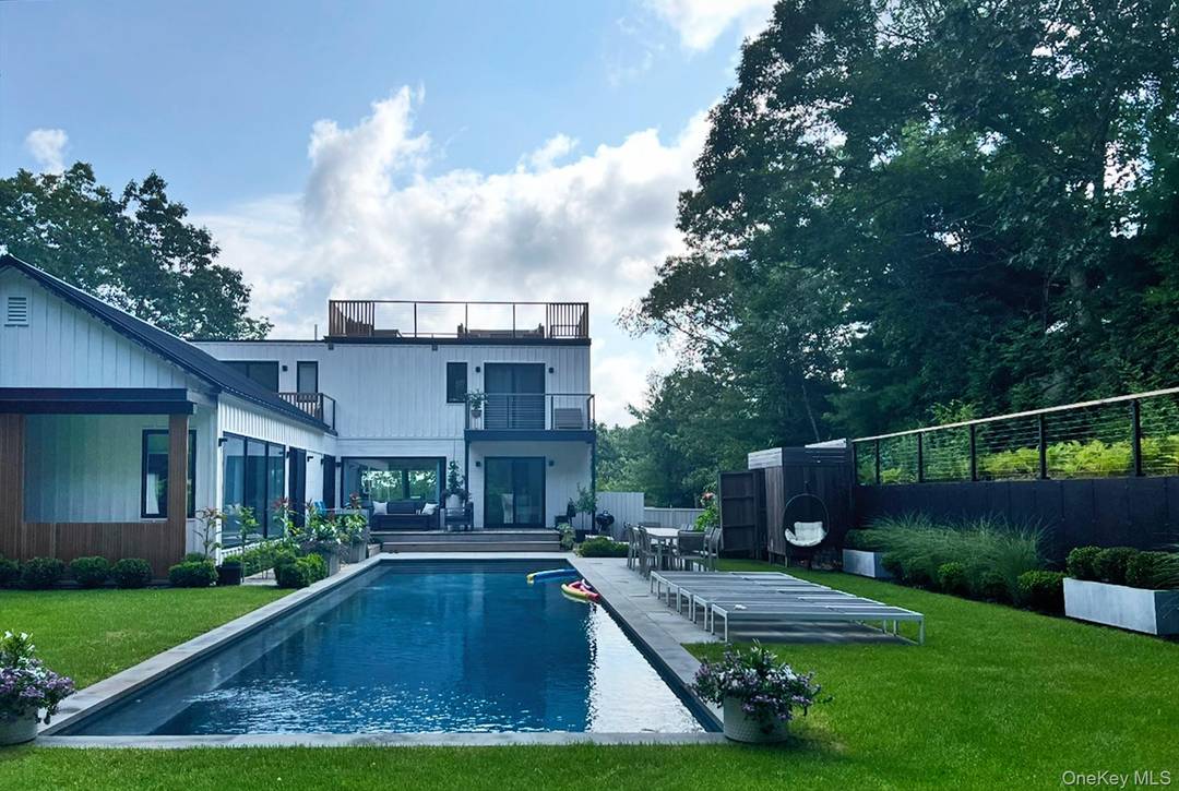 Beautifully open, bright and thoughtfully expanded, this recently renovated 5 bedroom, 7.