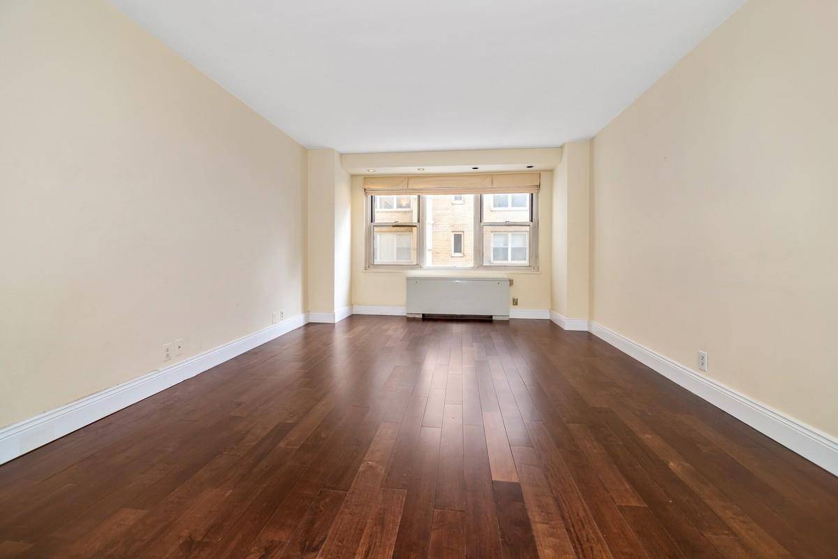 MOVE IN READY ! Lovely, quiet, sunny and spacious one bedroom in a full service, doorman elevator building centrally located Gramercy Park Kips Bay.