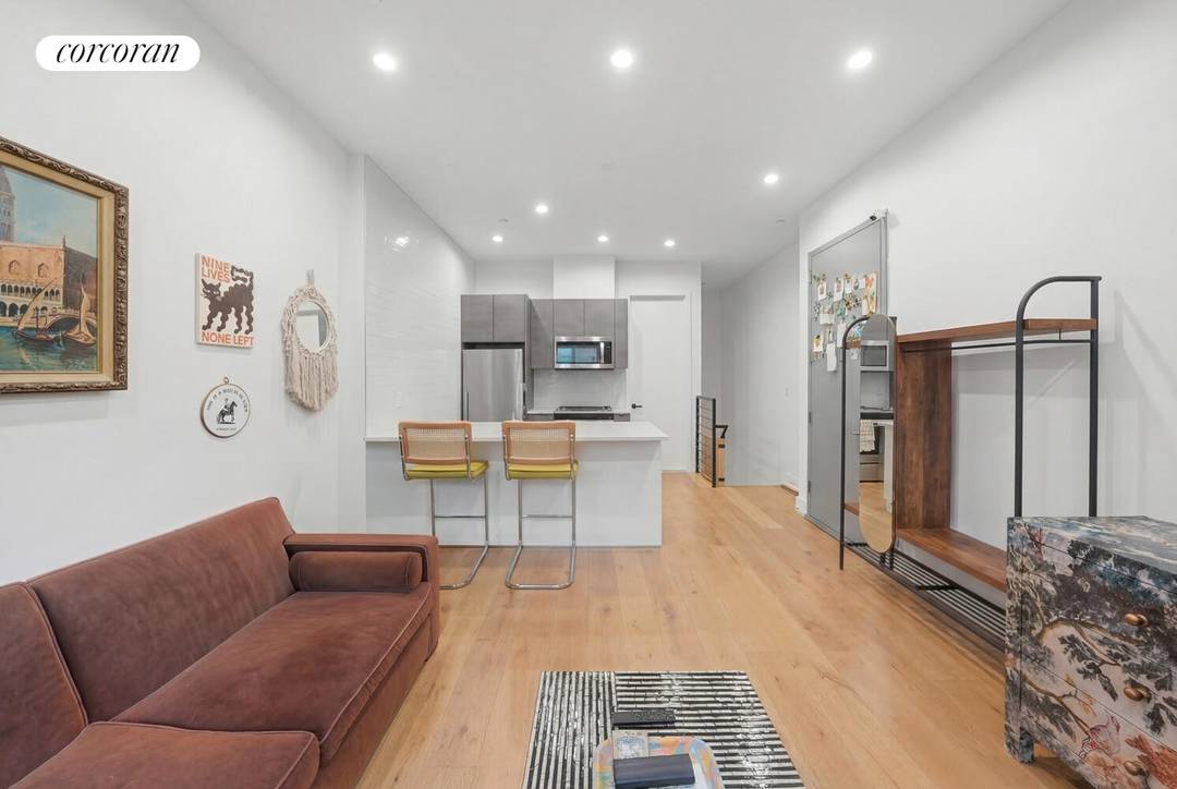 Welcome to 256 Winthrop Street, Unit 1A a modern, oversized studio that lives like a true one bedroom, complete with private outdoor space.