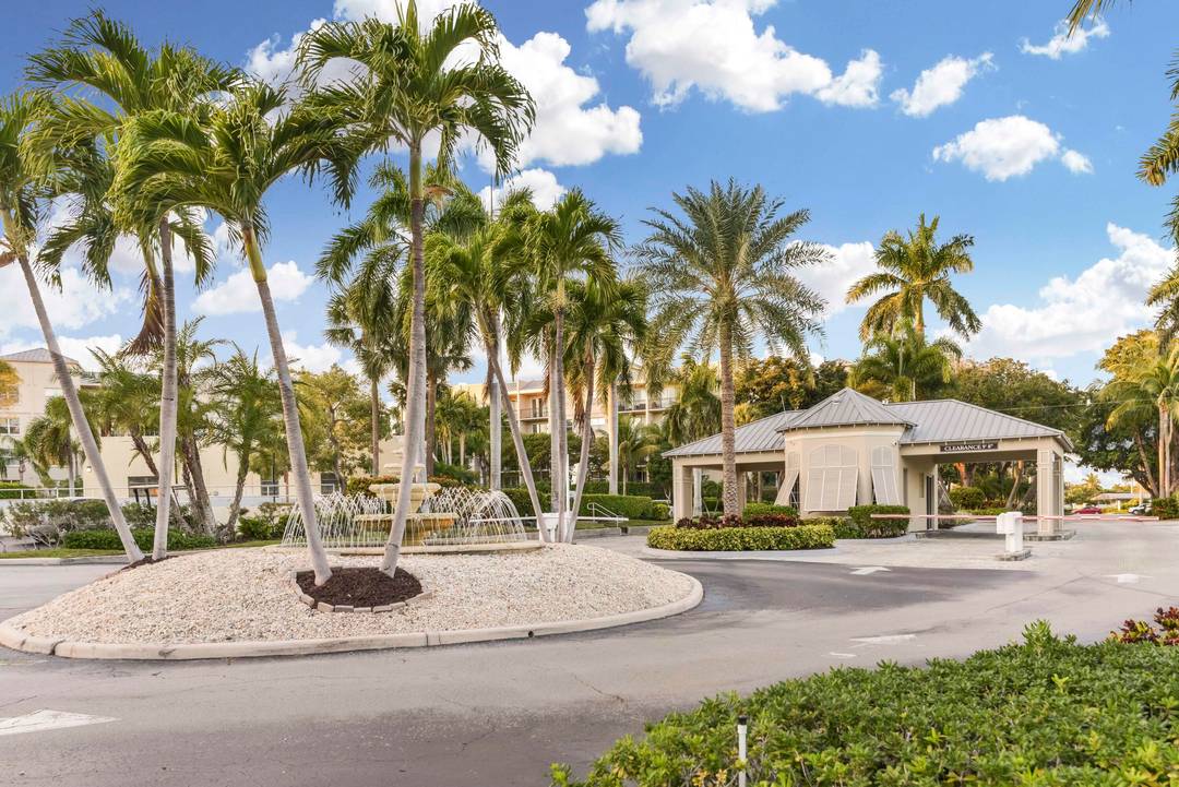 Experience luxury waterfront living at Boca Bayou, a premier gated community.