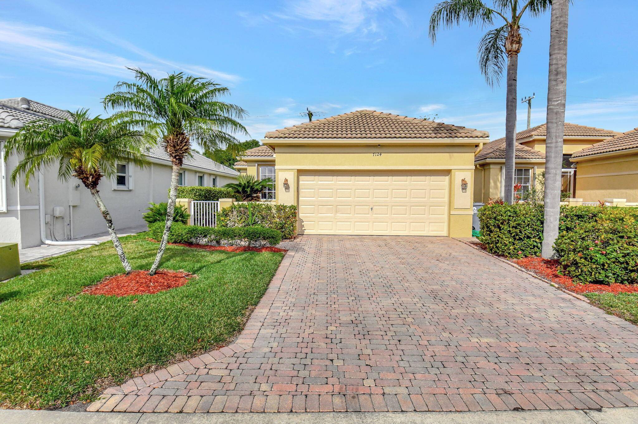 Welcome to 7124 Cataluna Circle, a lovely 3 bedroom, 2 bathroom home located in the desirable 55 community of Vizcaya in Delray Beach, Florida.