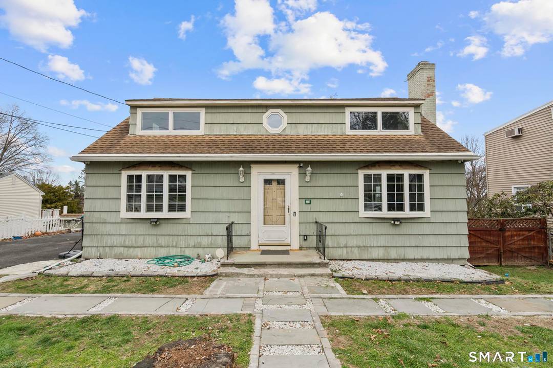 Welcome home to this spacious and gracious 4 bedroom retreat, perfectly situated in one of the area's most sought after neighborhoods.
