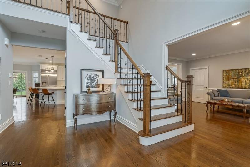 This 5, 300 square foot residence in a premier Brookside, cul de sac neighborhood offers a rare opportunity for newer construction on 2.