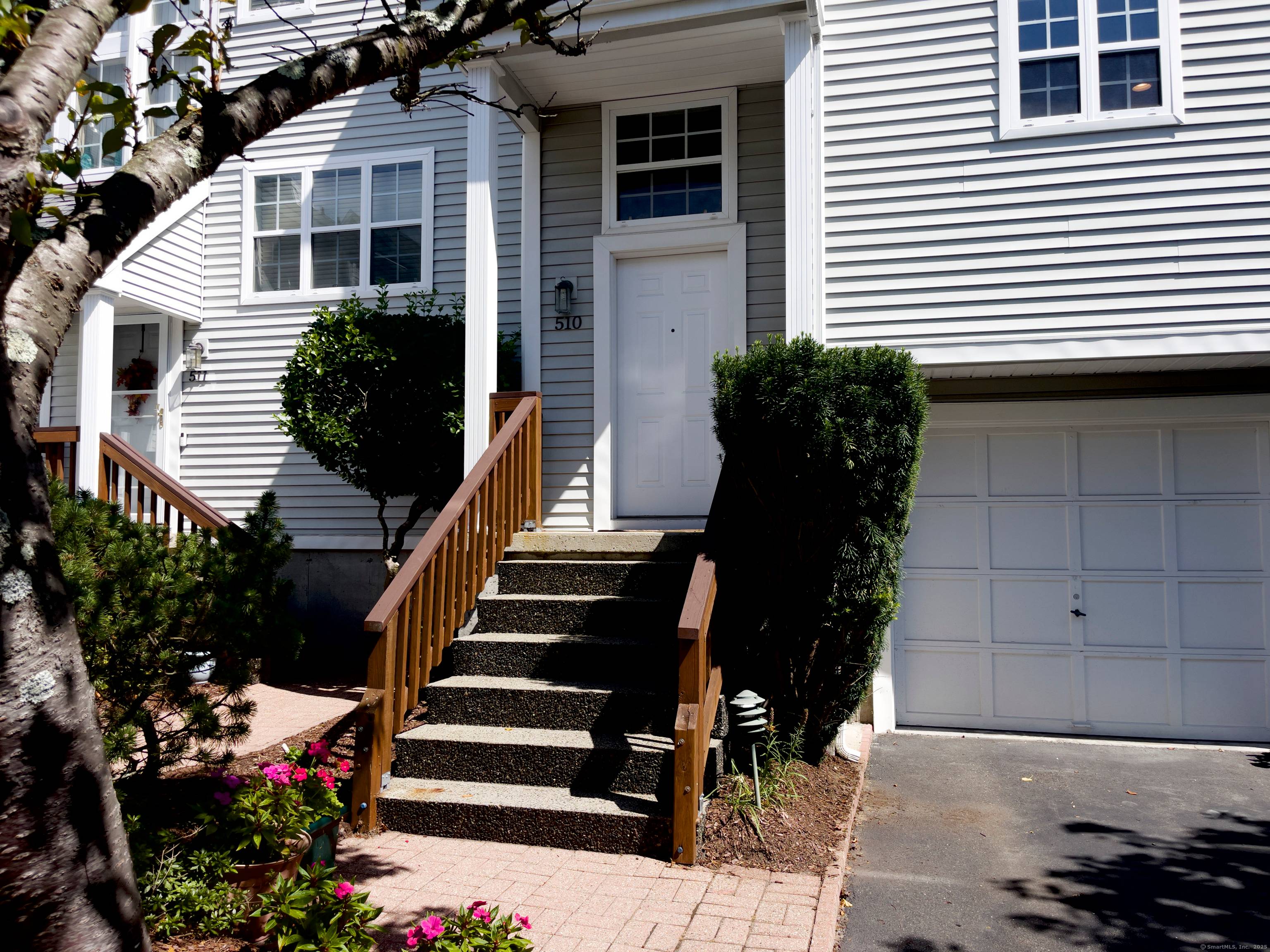 A pristine townhouse with under attached garage, beautiful new kitchen with new appliances, new hardwood flooring, freshly painted throughout, newer bathrooms, new HVAC, new lighting fixtures, etc.