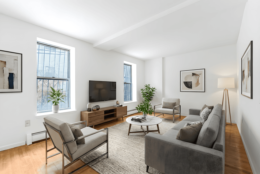 Experience the charm of this bright and airy apartment in a well maintained building at 472 Bainbridge Street.