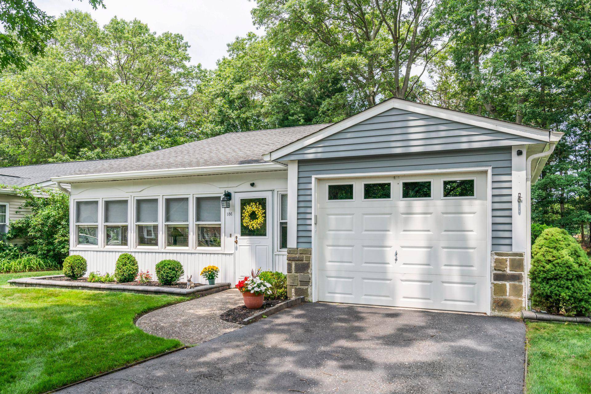 Immaculate Ridge home in affordable 55 retirement community with incredible value and amenities !