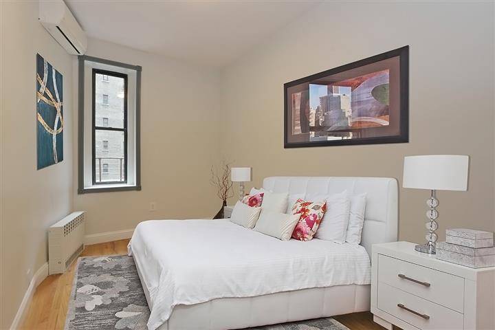 Beautiful Prewar 1 bedroom apartment with an outdoor balcony and decorative fireplace.