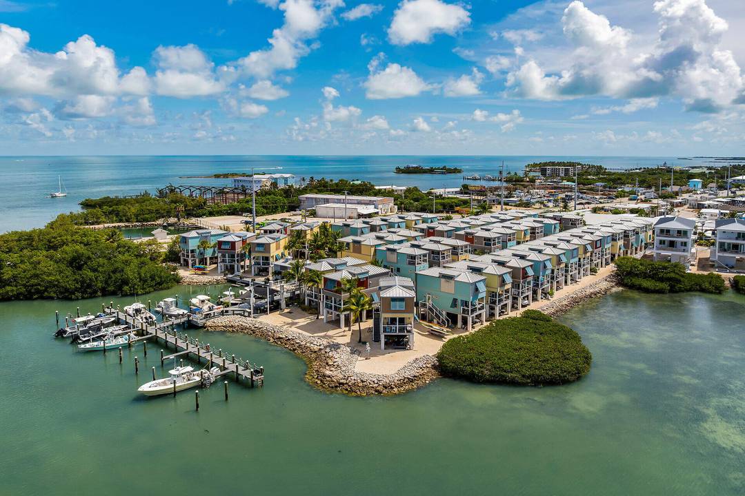 Turnkey island retreat in the Florida Keys with sunset views over 7 Mile Marina and resort style amenities.
