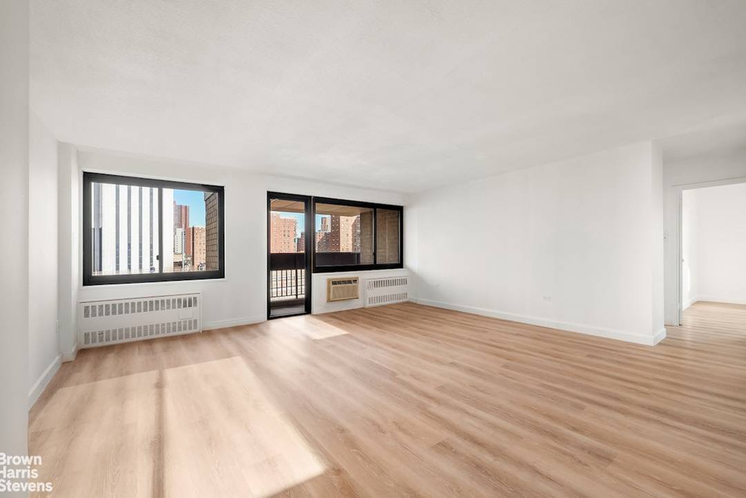 Sun filled, partially renovated true two bedroom with exceptionally low maintenance and iconic Brooklyn Bridge views.