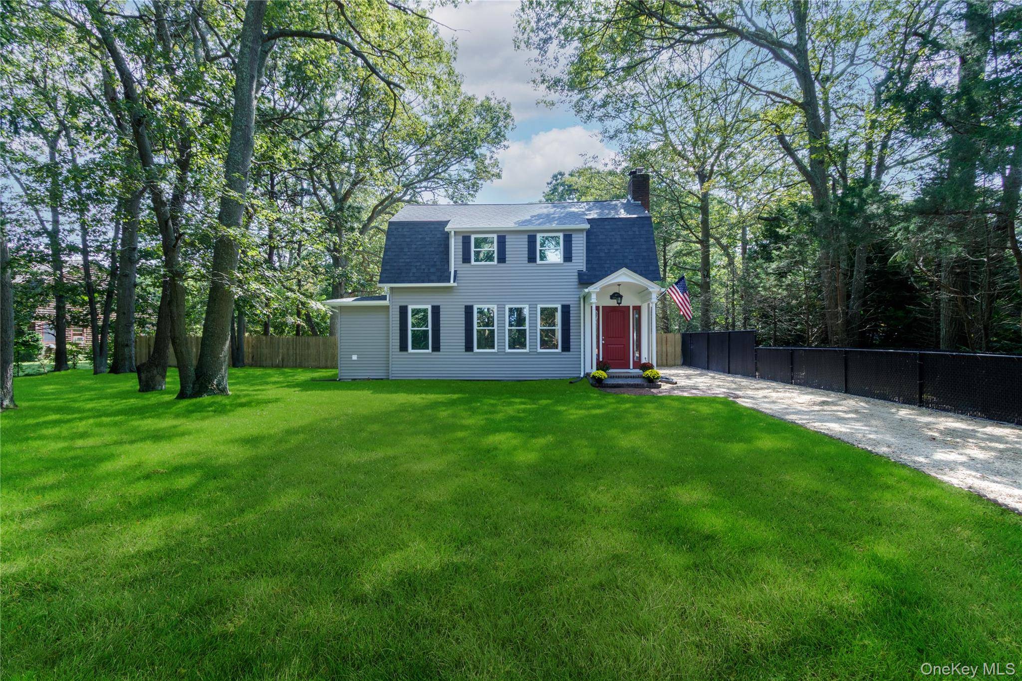 Welcome to this beautifully renovated historical colonial in East Moriches, surrounded by the charm of farms, nurseries, and vineyards.