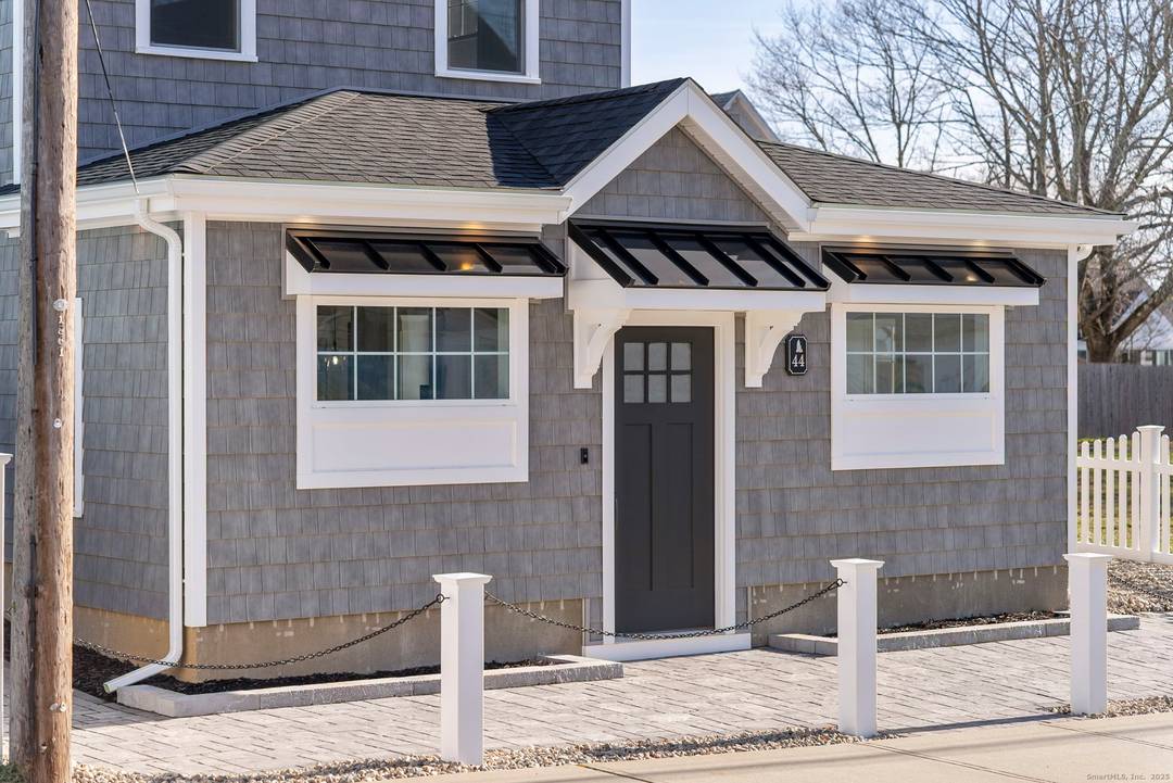 Just two blocks from the sandy shores of Sound View, this completely reimagined coastal home delivers the perfect blend of modern style and timeless beachside living.