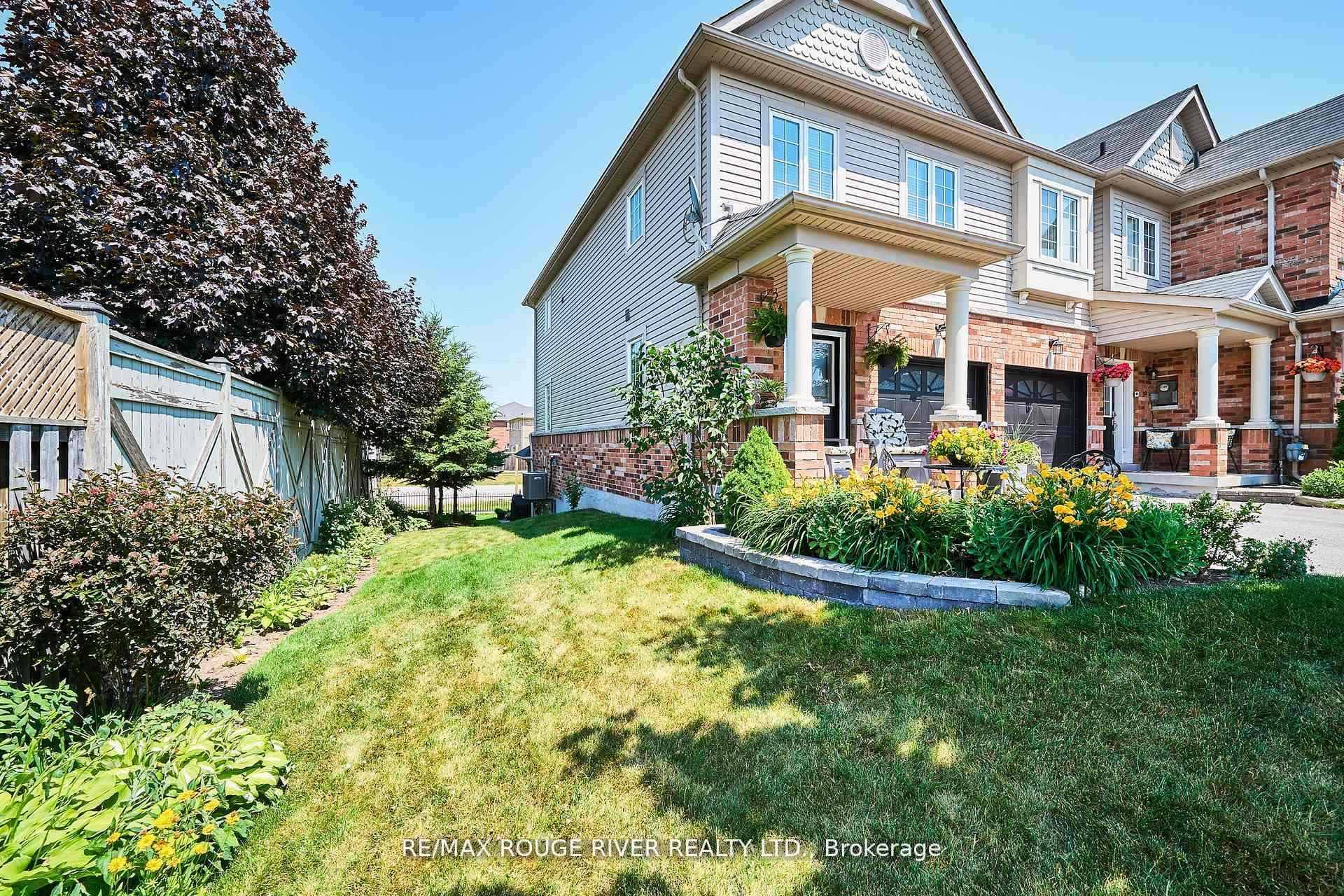 Spotless and Stylish Very Private End Unit Townhome features Extra Windows in Bathrooms Like a Semi Detached At Liberty Crossing Notables Include, Attractive Landscaping !