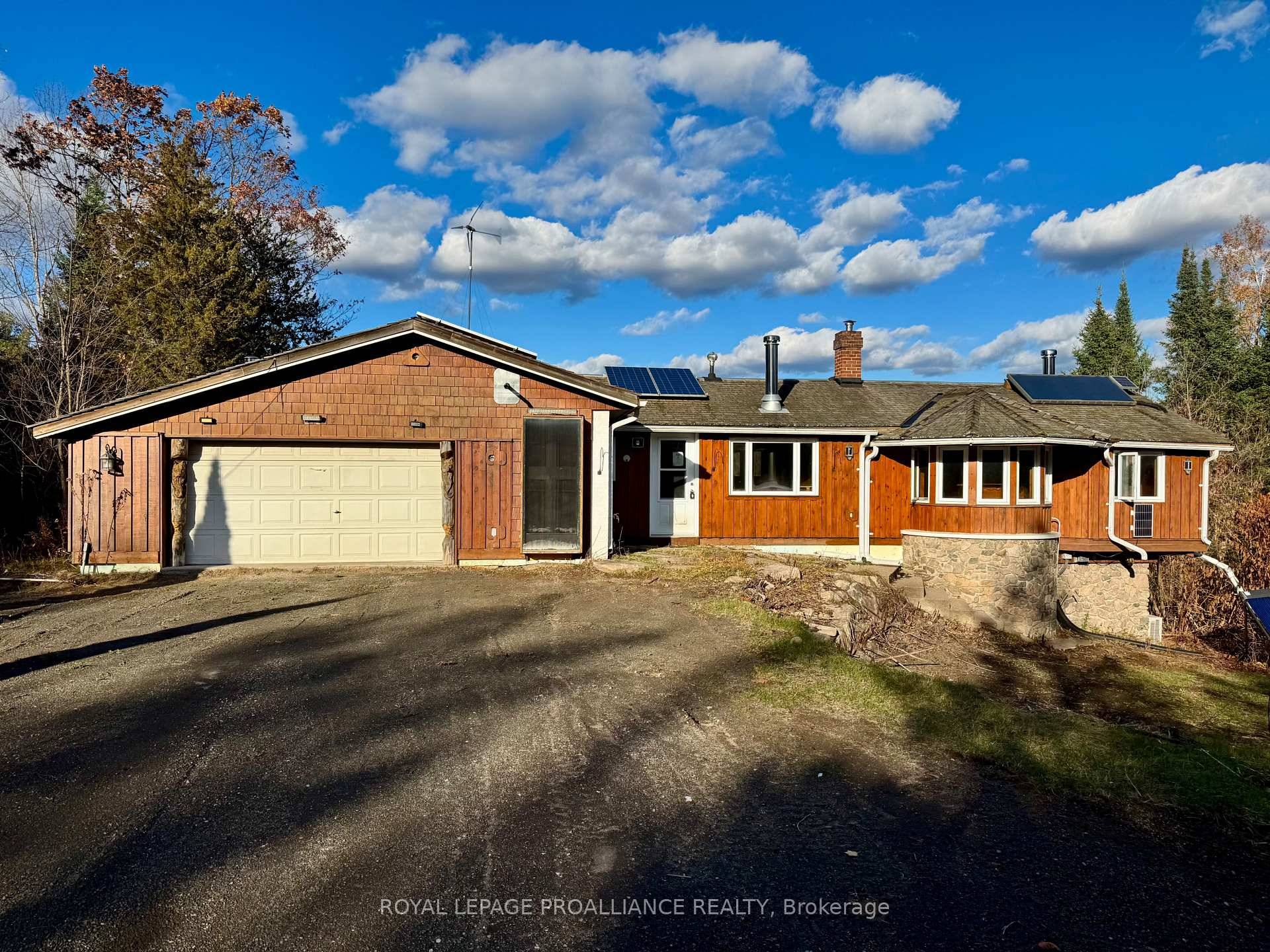 Bring your imagination and your tools to this solid home set on a private 3 acre lot in a desirable neighbourhood.