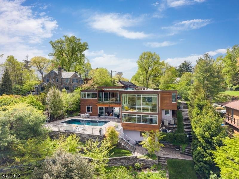 Once in a lifetime, you may be fortunate enough to discover a home that is not only artful in design mindfully crafted in every detail, but also perfectly set w ...