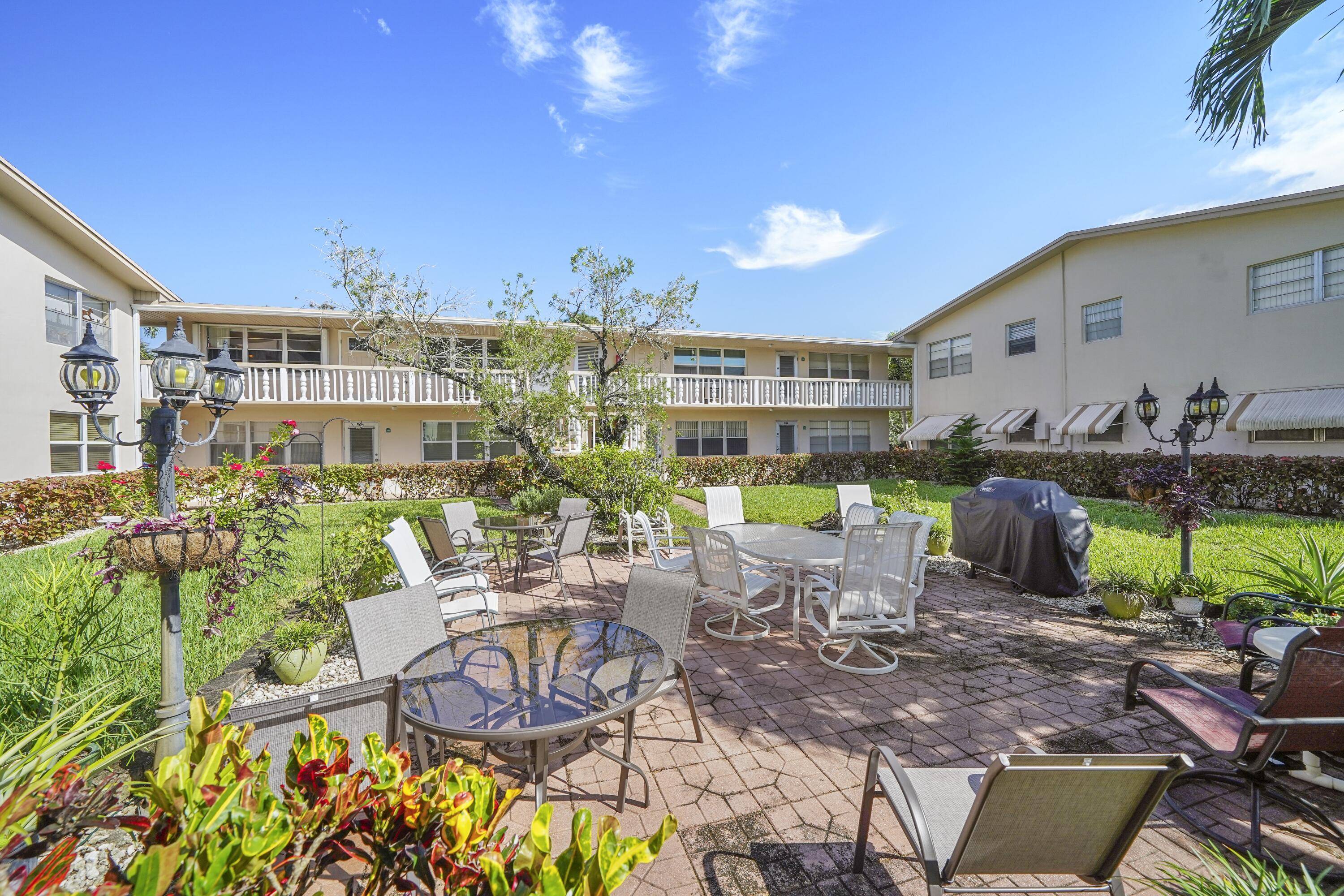 Seize the opportunity to own this stunning, one bedroom second floor Corner condo in the 55 community of Century Village.