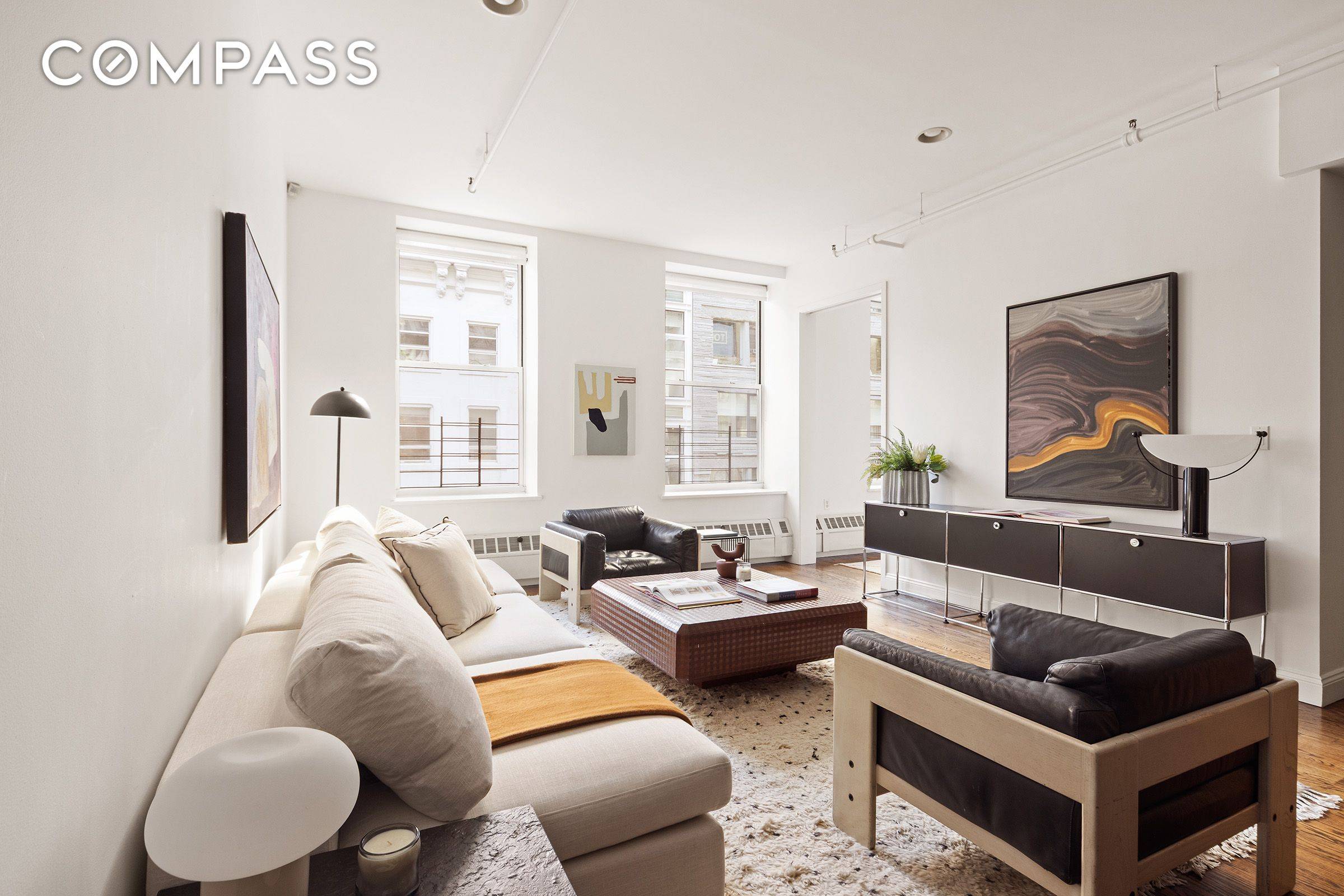 3 Bedroom Condo Loft in the Heart of Tribeca This spacious and beautifully designed loft offers generous living and dining areas framed by oversized windows and abundant natural light.