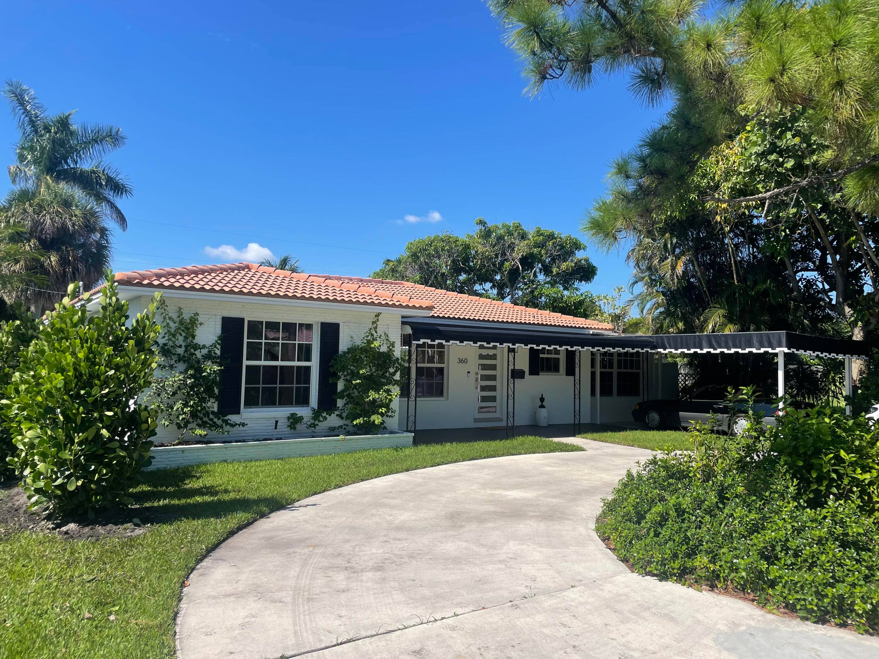 Palm Beach Luxury in the Heart of 'SoSo' This turn key coastal oasis has been beautifully and tastefully renovated for effortless modern living.