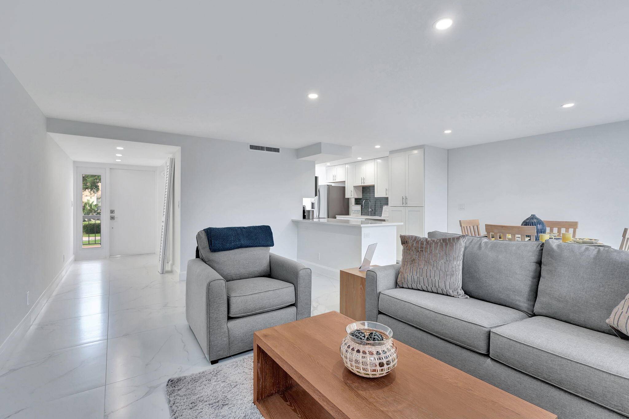 Fully renovated 2nd floor townhouse in desirable Bridgewood ; within walking distance to the pool, fitness center, spa.