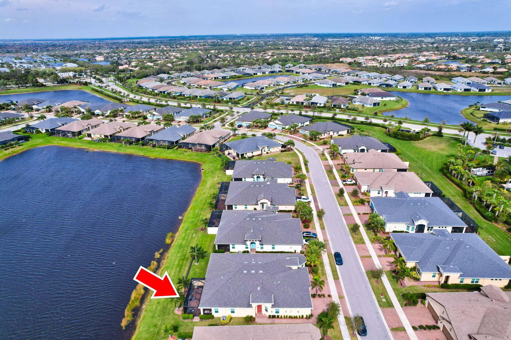BUILT IN 2021, this IMMACULATE 55 villa offers 2 bedrooms, a DEDICATED OFFICE WITH ELEGANT FRENCH DOORS, and a separate laundry room.
