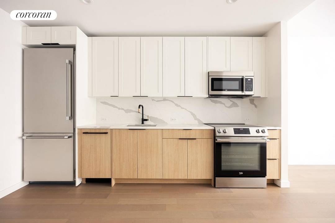 Western Facing Designer one bedroom with Lower Manhattan, Downtown Brooklyn and NY Harbor Views and an exclusive rooftop patio.