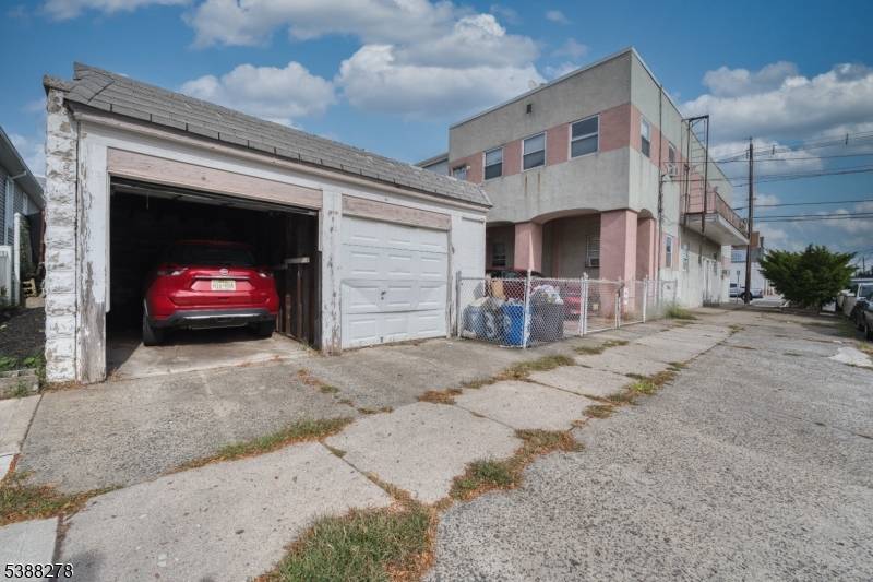 Welcome to 233 Avenue B A Prime 4 Family Corner Investment Opportunity in Bayonne Discover this exceptional corner property offering 7 bedrooms, 5 bathrooms, a finished basement, and rare parking ...