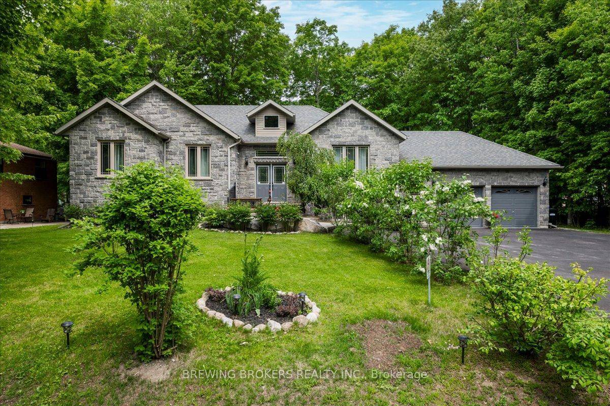 Welcome to your dream ranch bungalow in picturesque Tiny Township !