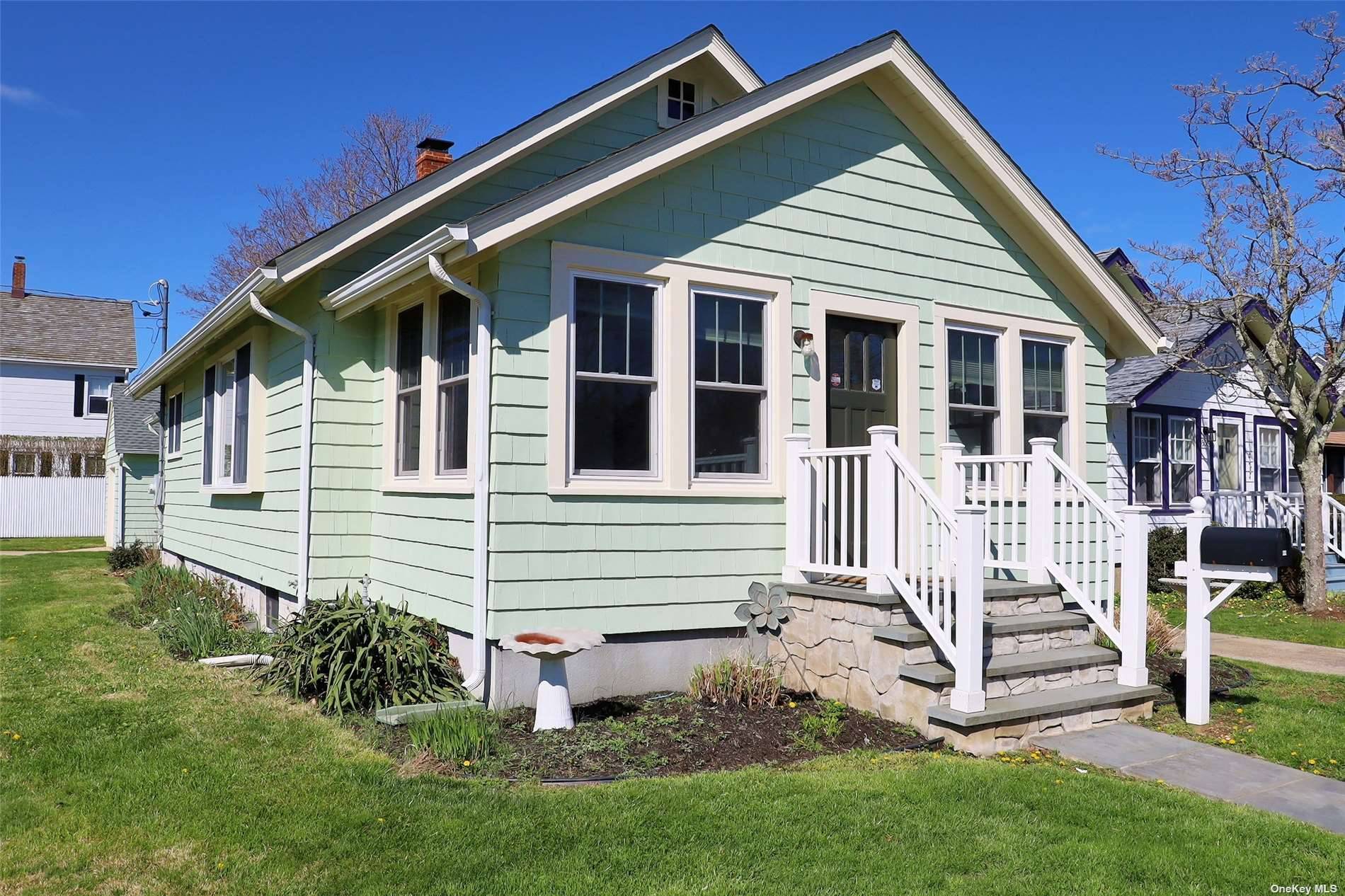 Updated Vintage Bungalow with Detached Garage and Full Basement.