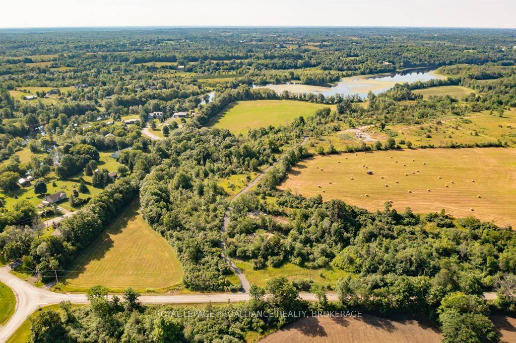 Opportunity knocks. 10 Acre parcel with nearly 250ft of water frontage on the Napanee River.