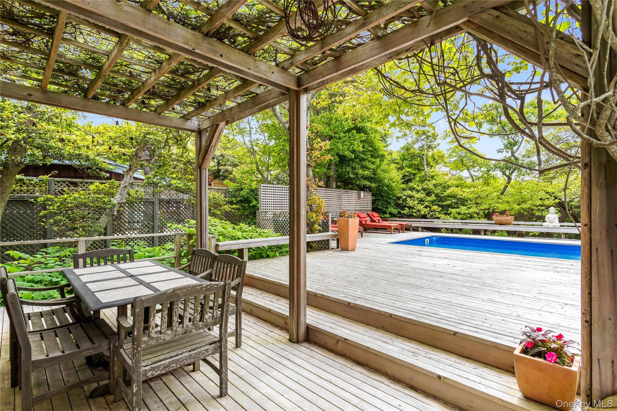 Classic mid century beach house with large saltwater pool is the last word in casual beach living.