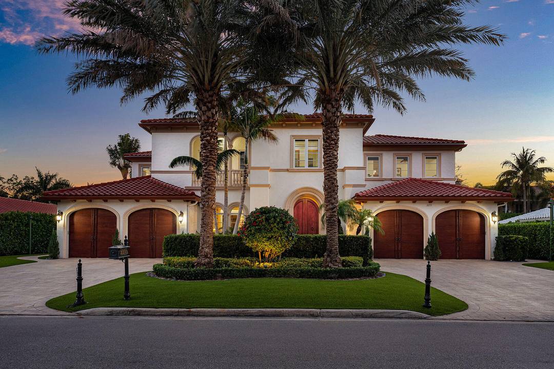 This exceptional residence presents a rare blend of timeless Mizner architecture and modern luxury.