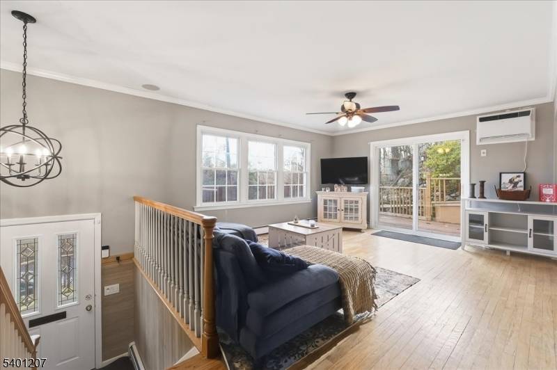 Discover a rare opportunity to own a bi level home perched high on the Ramapo Mountains in Oakland's sought after Crystal Lake community.