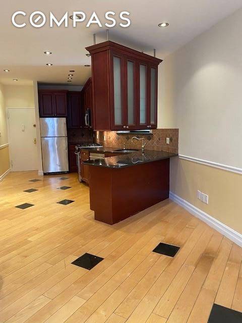 READY FOR SUMMER ? Come fast to view this gorgeous 3 BR, 2 full bath DUPLEX condominium on a tree lined street with your own outdoor deck.