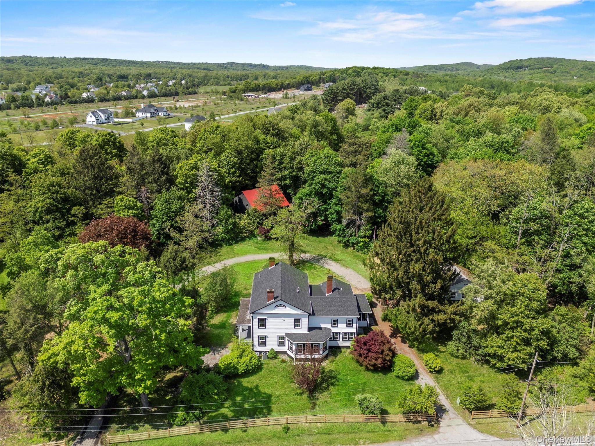 Discover timeless charm blended with modern comfort in this Classic Circa 1810 Historical Beauty, set on 7 acres in the heart of the Hudson Valley !