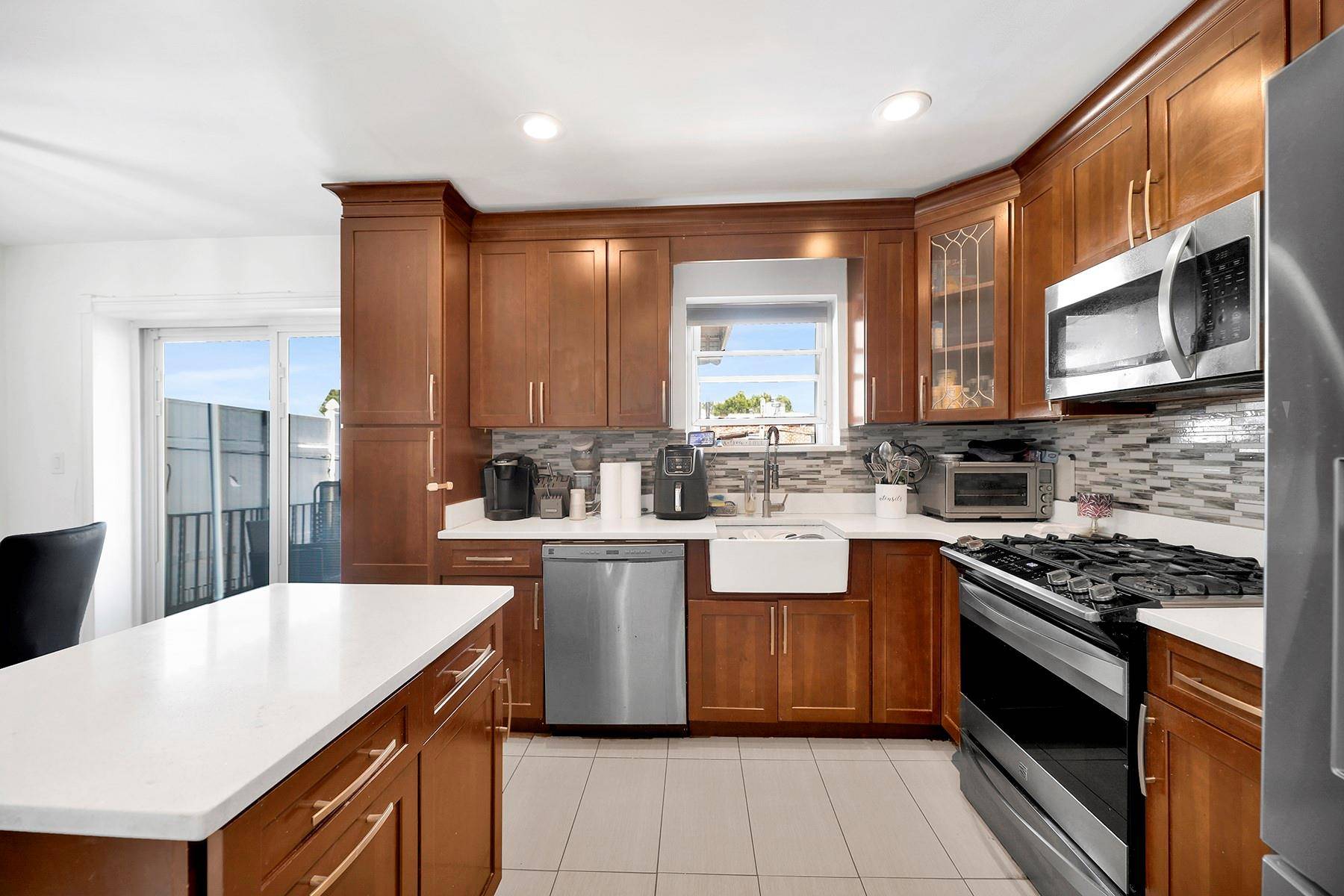 Triple mint condition move in ready brick single family nestled on a beautiful tree lined street of Throggs Neck !
