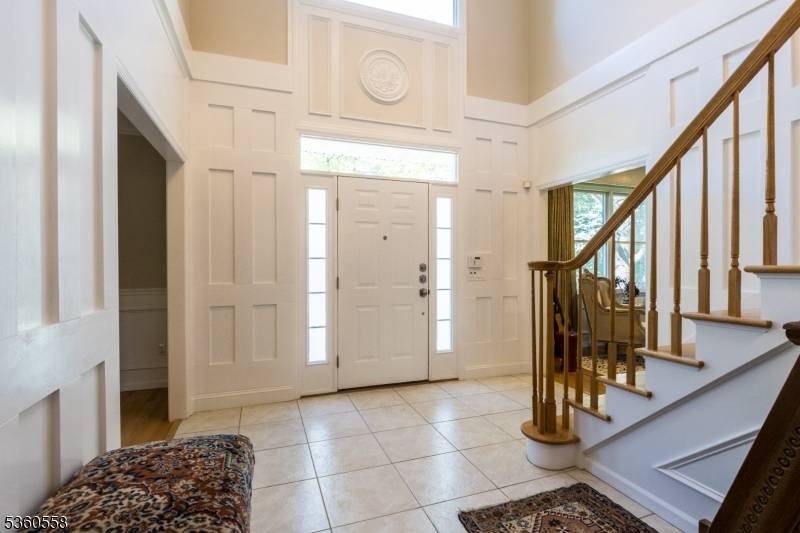 Welcome to over 5, 100 sq ft of refined living in this elegant 5 bedroom, 4 full and 2 half bath Center Hall Colonial, ideally located within walking distance to ...