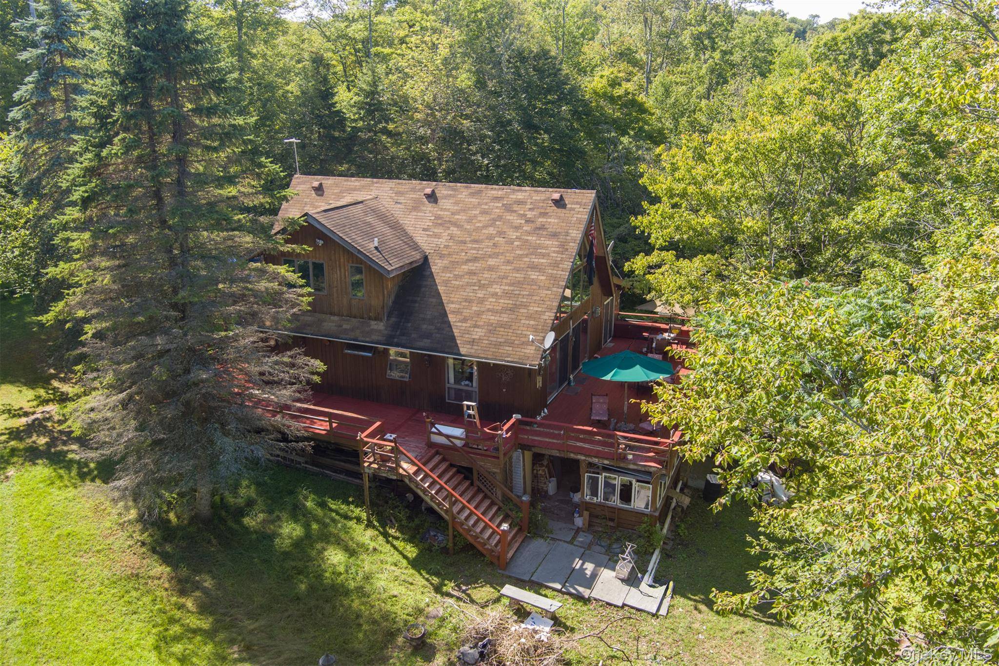Discover this charming three bedroom, two bathroom Cedar Cabin nestled in scenic Roscoe.